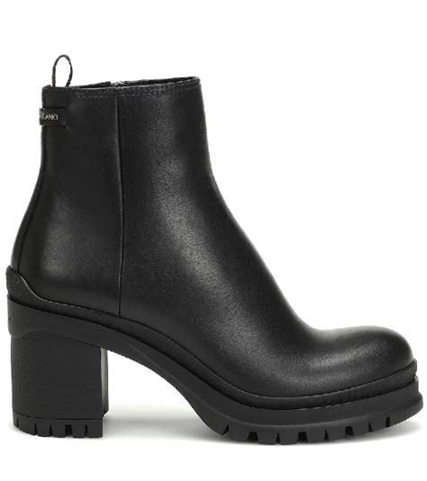 prada lugged rubber sole booties|Black Leather booties .